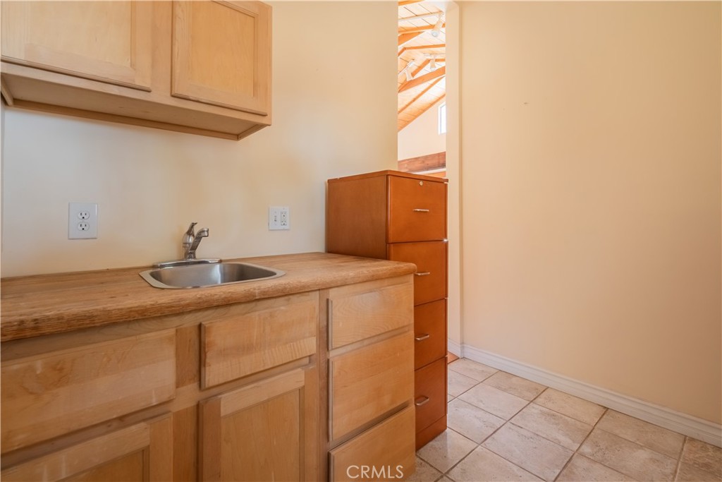 3430 Chaney Trail Altadena, CA 91001 - Photo 23 of 50 a utility room with a sink