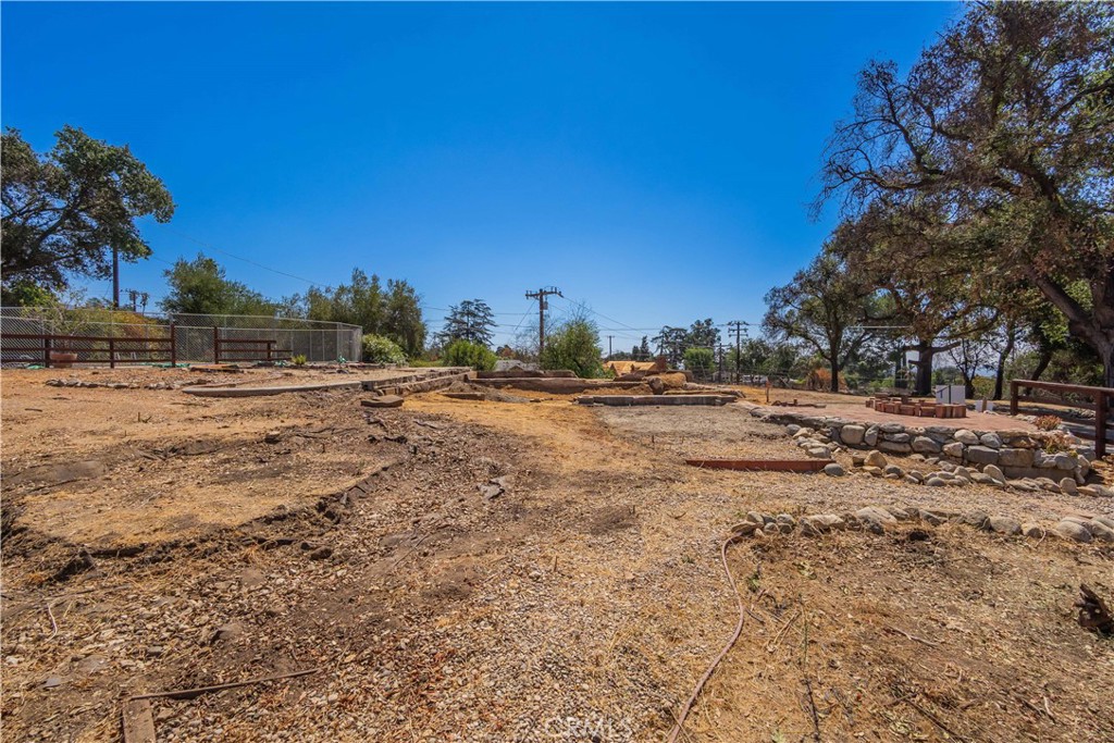 3430 Chaney Trail Altadena, CA 91001 - Photo 27 of 50 a view of dirt yard with a large tree