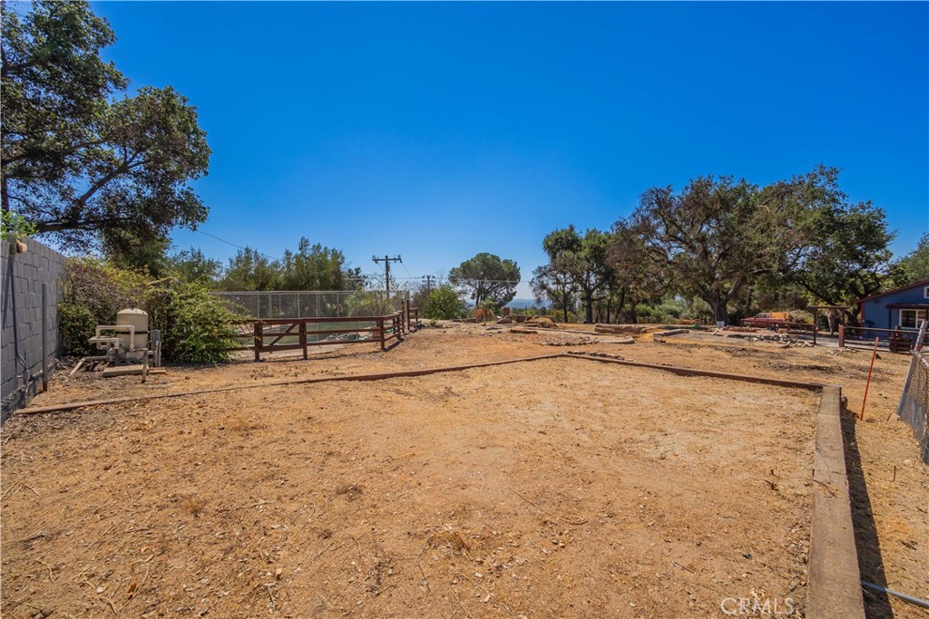 3430 Chaney Trail Altadena, CA 91001 - Photo 31 of 50 a view of a yard with trees in the background