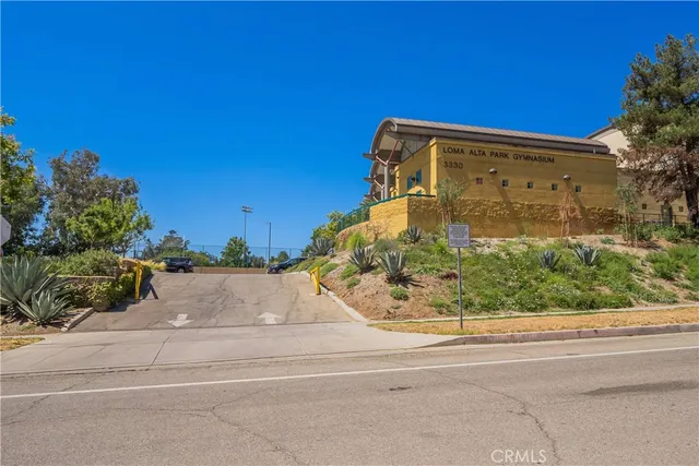 a view of a backyard with sitting area