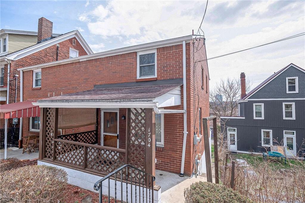 1704 Duffield Street Pittsburgh, PA 15206 - Photo 1 of 32 a front view of a house with glass windows