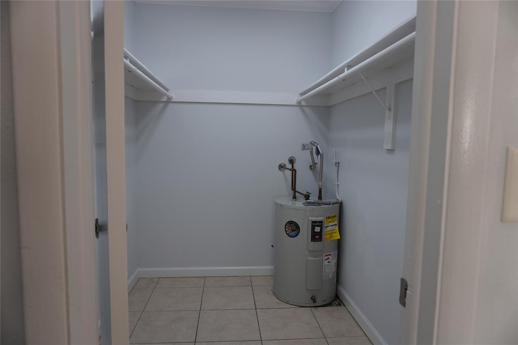 1050 East Sample Road, Unit 104 Pompano Beach, FL 33064 - Photo 14 of 14 a view of water heater room