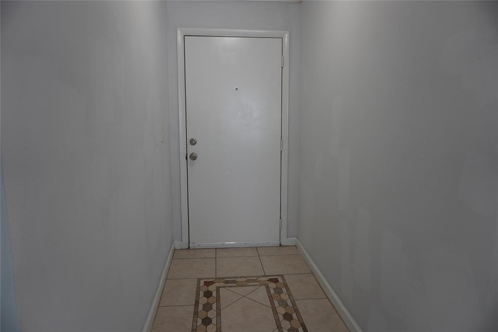 1050 East Sample Road, Unit 104 Pompano Beach, FL 33064 - Photo 9 of 14 a view of utility room