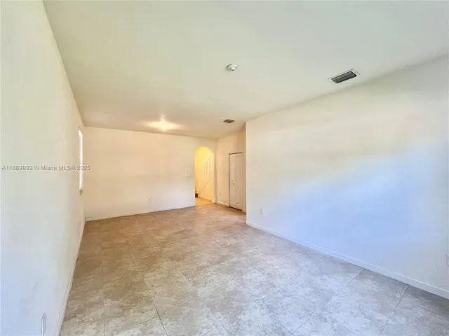 a view of a room with stairs