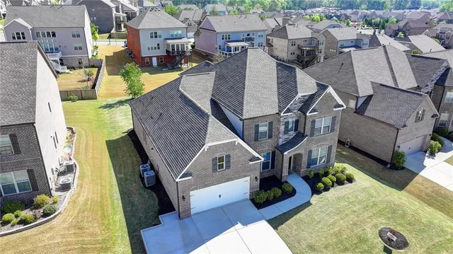 a aerial view of a house with a swimming pool