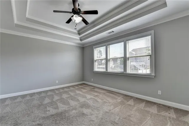 wooden floor in a hall with a window and wooden floor