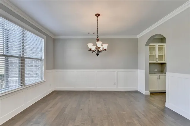 a view of a livingroom with wooden floor