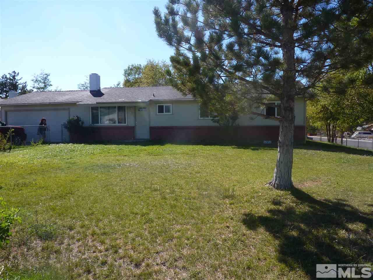1420 Monte Rosa Drive Carson City, NV 89701 - Photo 1 of 1 a view of a house with a yard