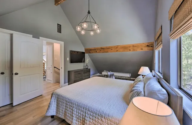 a view of a chair and table in the garden