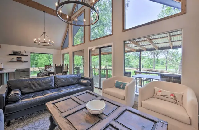 a living room with furniture and a window