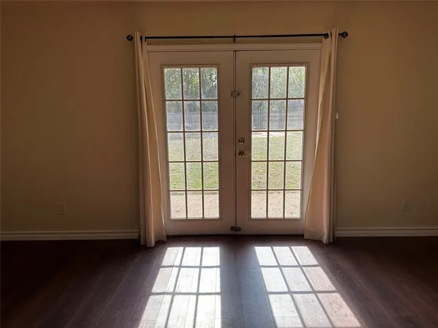 a view of an empty room and window