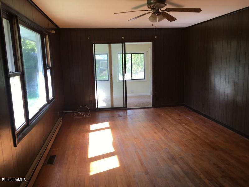 2898 Hancock Road Hancock, MA 01267 - Photo 12 of 44 an empty room with wooden floor and windows