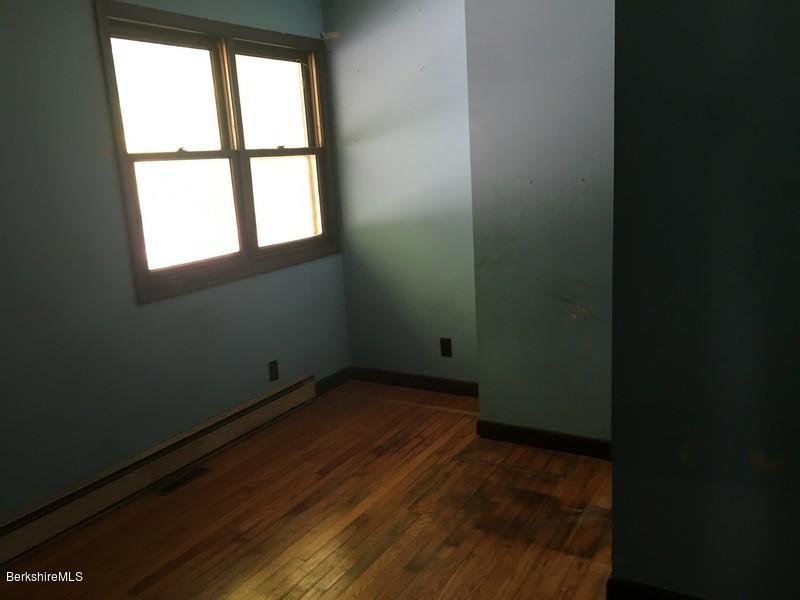 2898 Hancock Road Hancock, MA 01267 - Photo 23 of 44 a view of a room with wooden floor and windows
