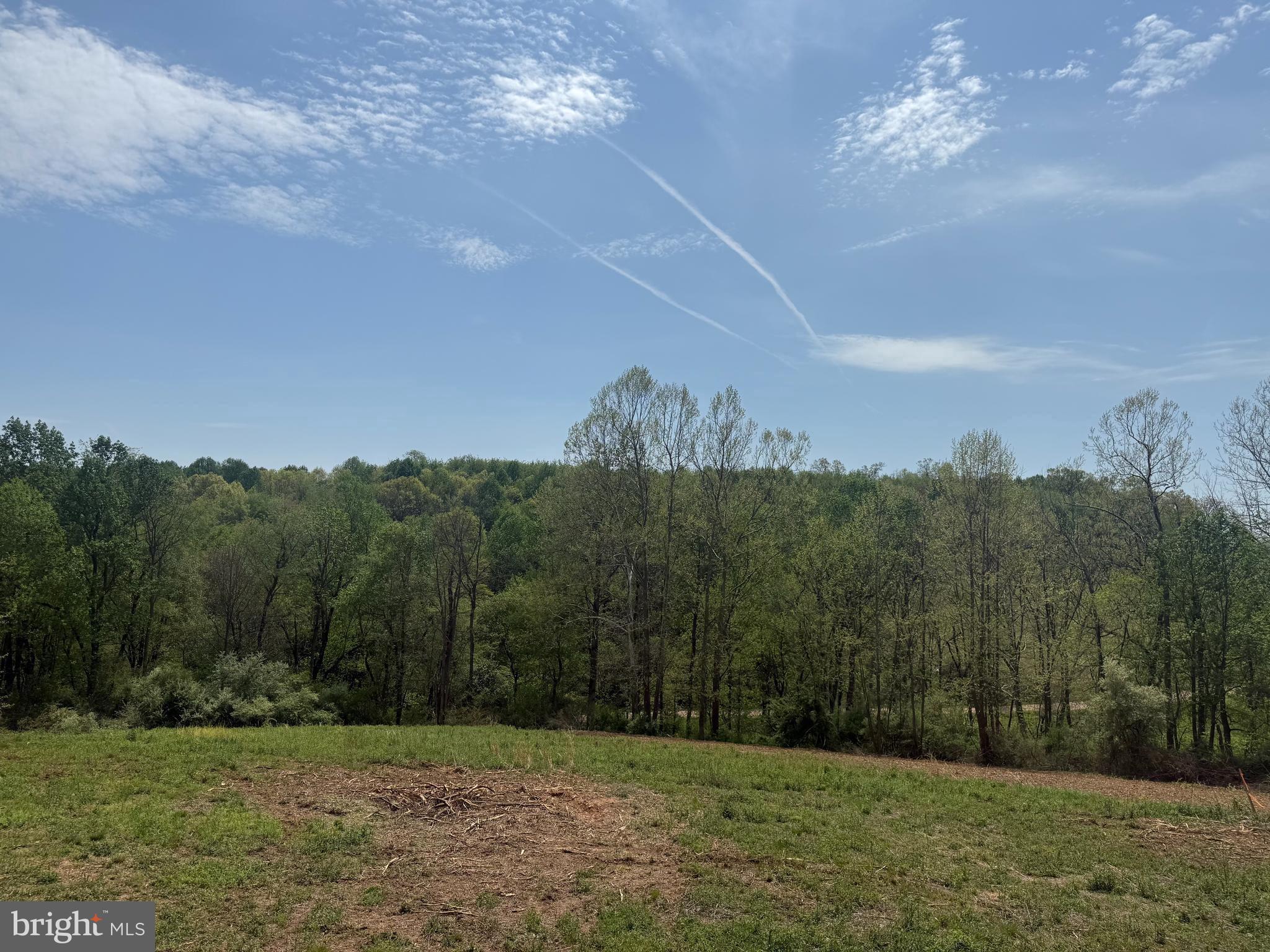 0 Brenneman Road, Unit LOT 2 Glen Rock, PA 17327 - Photo 2 of 5 a view of a grassy field with trees in the background