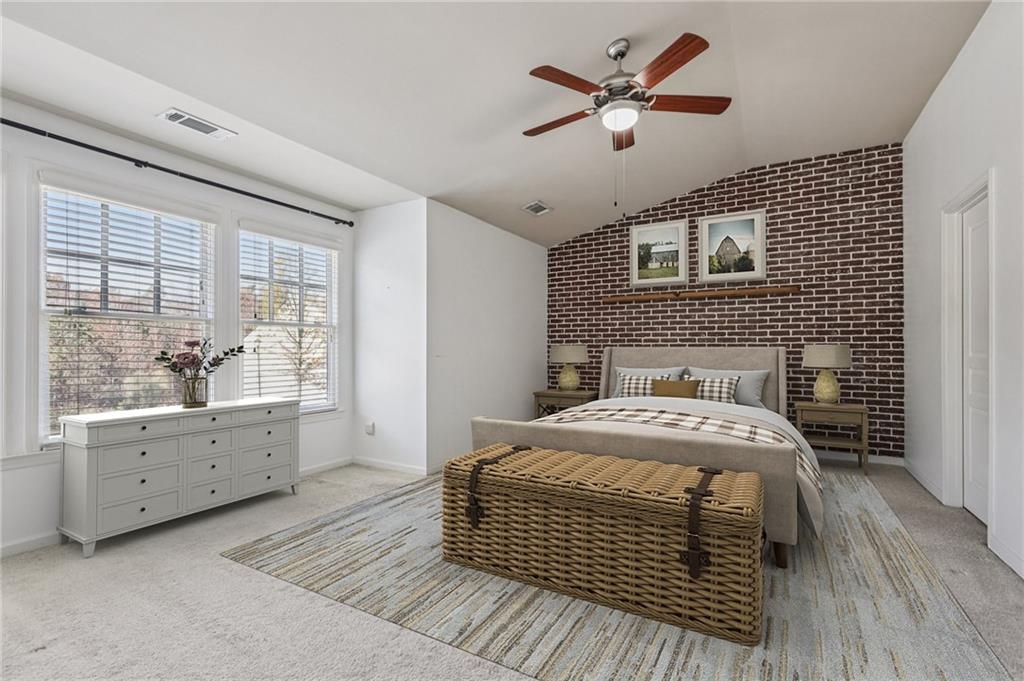 1465 Queens Lane Alpharetta, GA 30004 - Photo 9 of 24 a bedroom with a bed and a desk chair in it