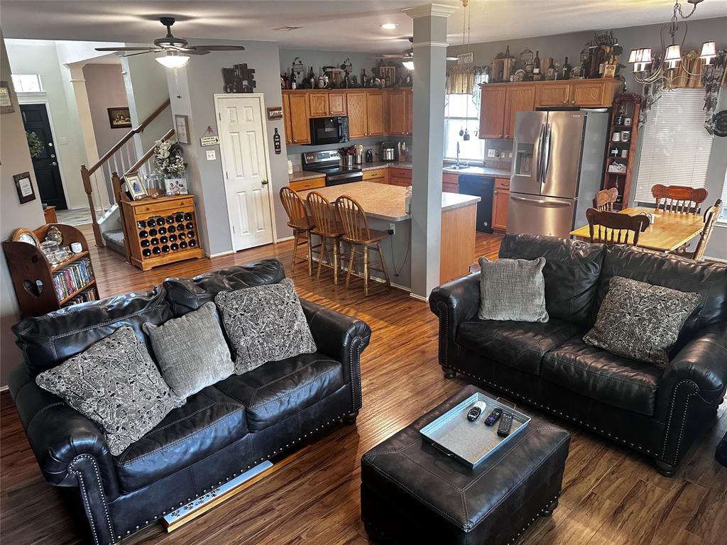 103 Denali Court Terrell, TX 75160 - Photo 15 of 39 a living room with furniture and a flat screen tv