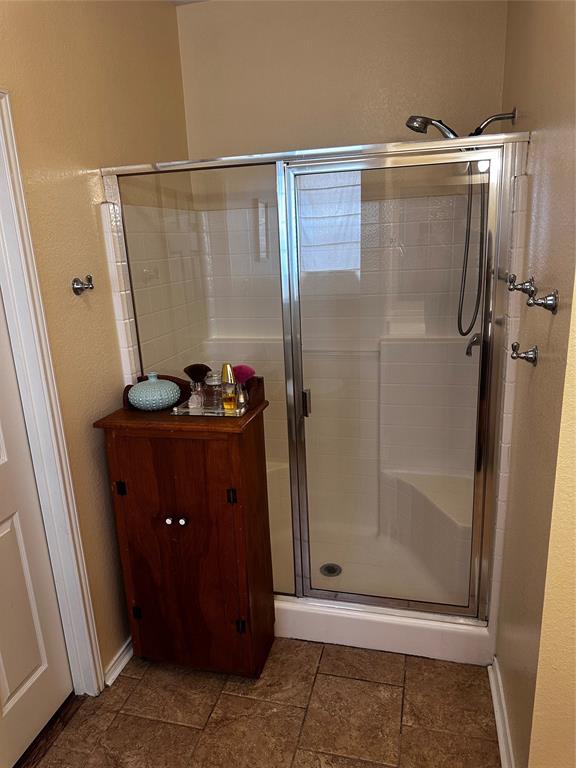 103 Denali Court Terrell, TX 75160 - Photo 22 of 39 a bathroom with a shower