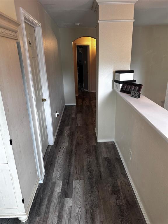103 Denali Court Terrell, TX 75160 - Photo 27 of 39 a view of a hallway with wooden floor and staircase