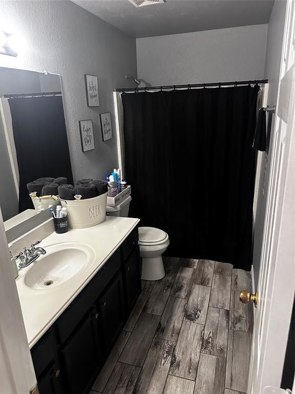 103 Denali Court Terrell, TX 75160 - Photo 33 of 39 a bathroom with a sink toilet and shower