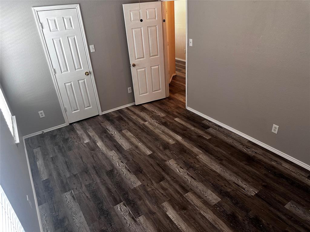 103 Denali Court Terrell, TX 75160 - Photo 36 of 39 a view of a room with wooden floor