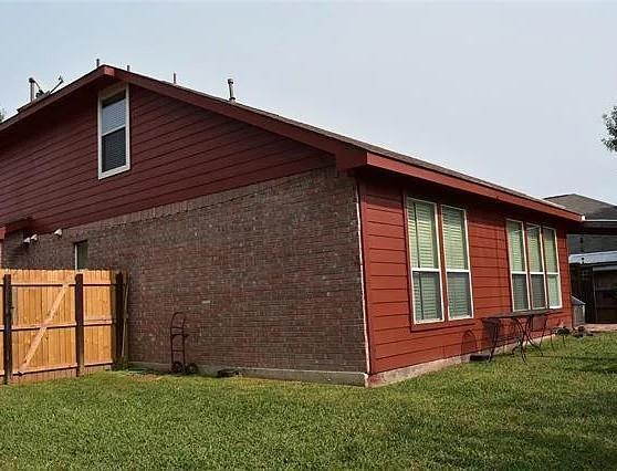103 Denali Court Terrell, TX 75160 - Photo 37 of 39 a front view of a house with a garden