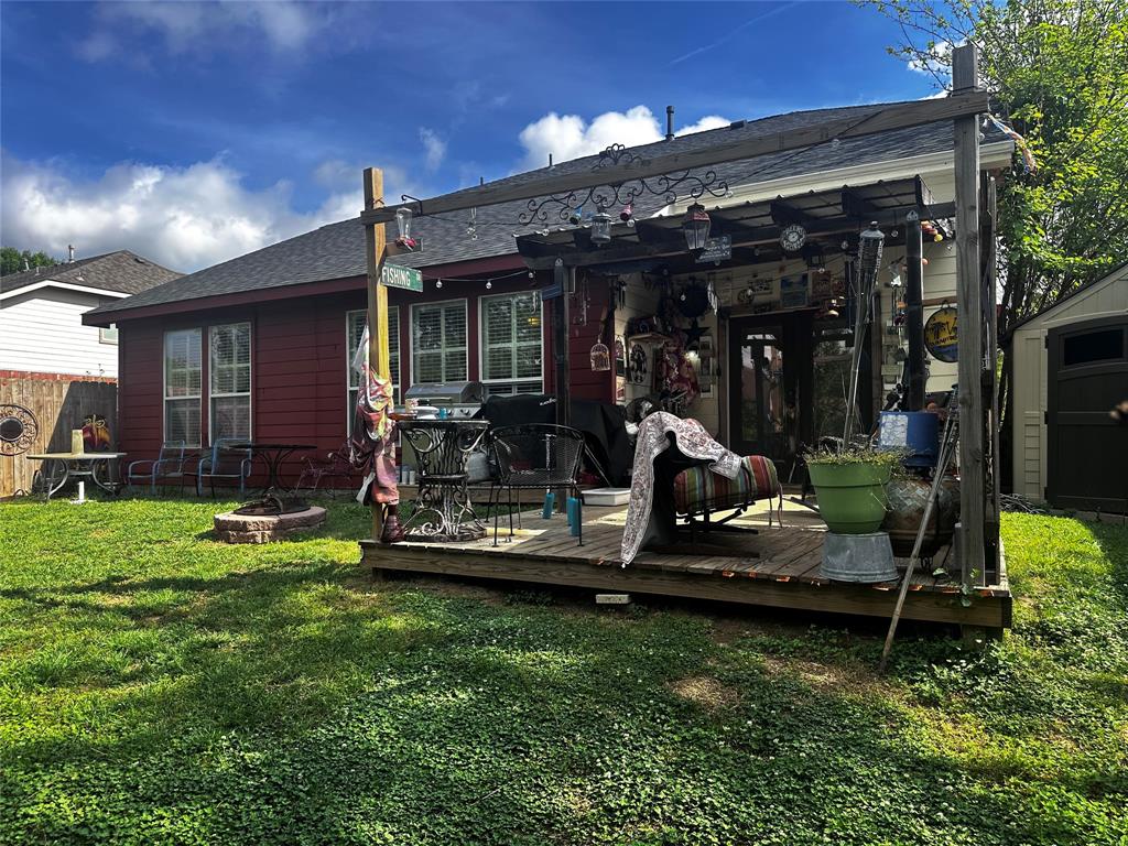 103 Denali Court Terrell, TX 75160 - Photo 39 of 39 a view of a backyard with table and chairs and potted plants
