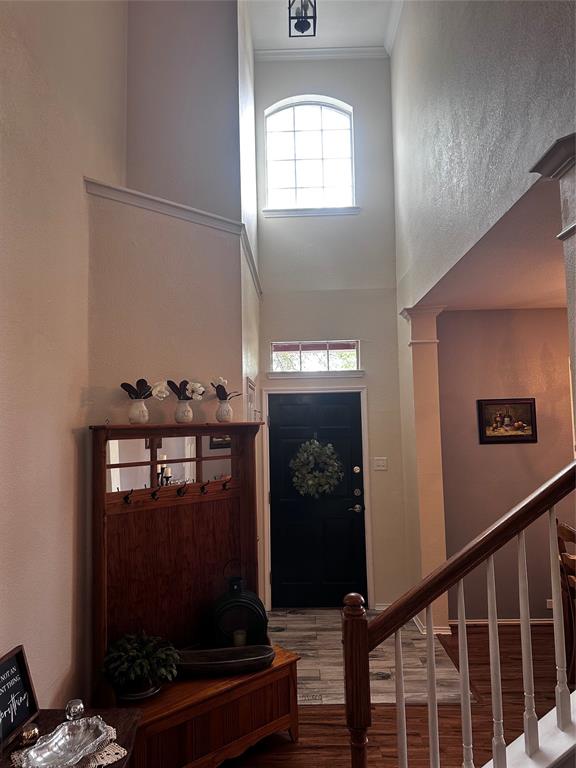 103 Denali Court Terrell, TX 75160 - Photo 4 of 39 a view of entryway and hall with wooden floor