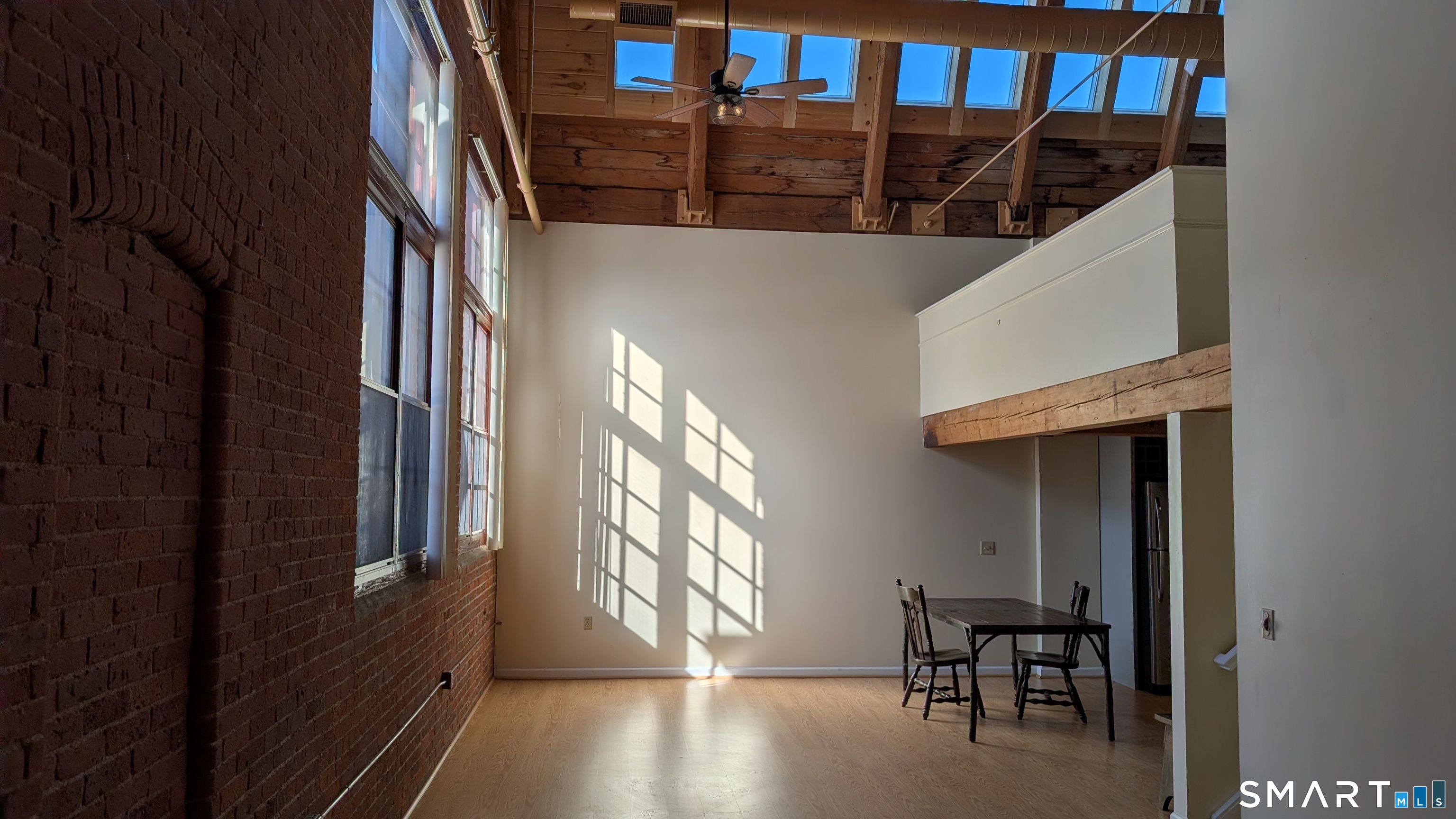 839 Main Street, Unit 98 Torrington, CT 06790 - Photo 22 of 49 a view of entryway and hall with wooden floor