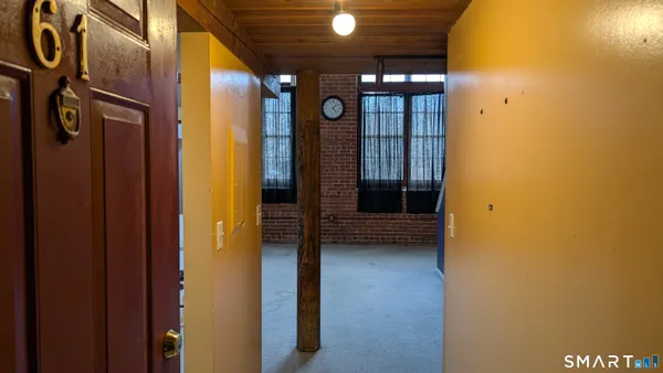 a view of entryway with a hallway