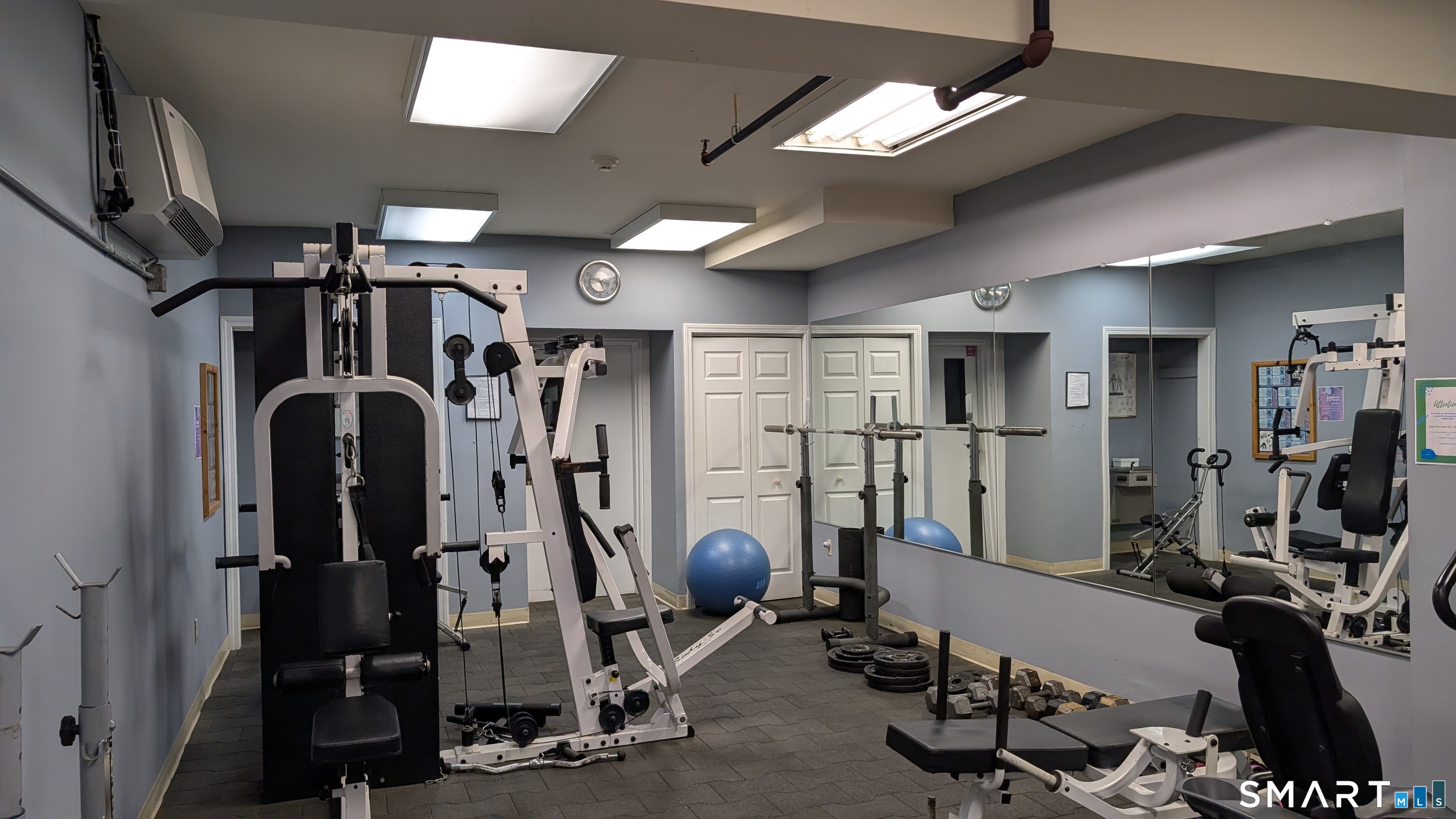 839 Main Street, Unit 98 Torrington, CT 06790 - Photo 45 of 49 a view of a room with gym equipment