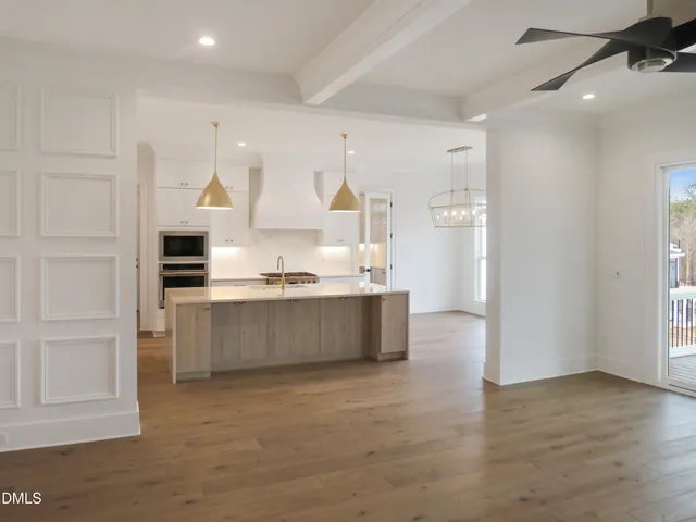 a bathroom with double sink and a mirror