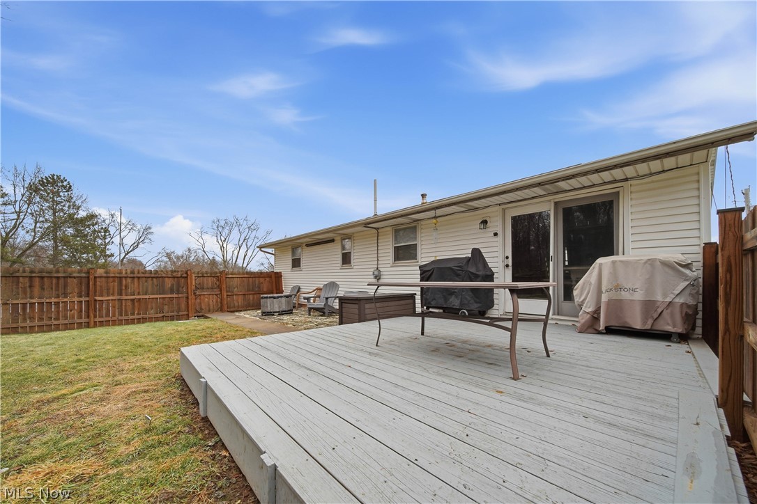 702 Perry Drive Northwest Canton, OH 44708 - Photo 44 of 46 Wooden deck featuring a fenced backyard and a grill