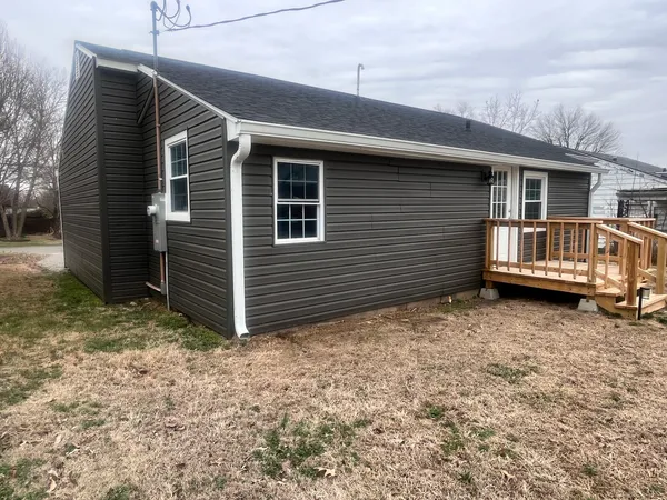 a view of backyard of house