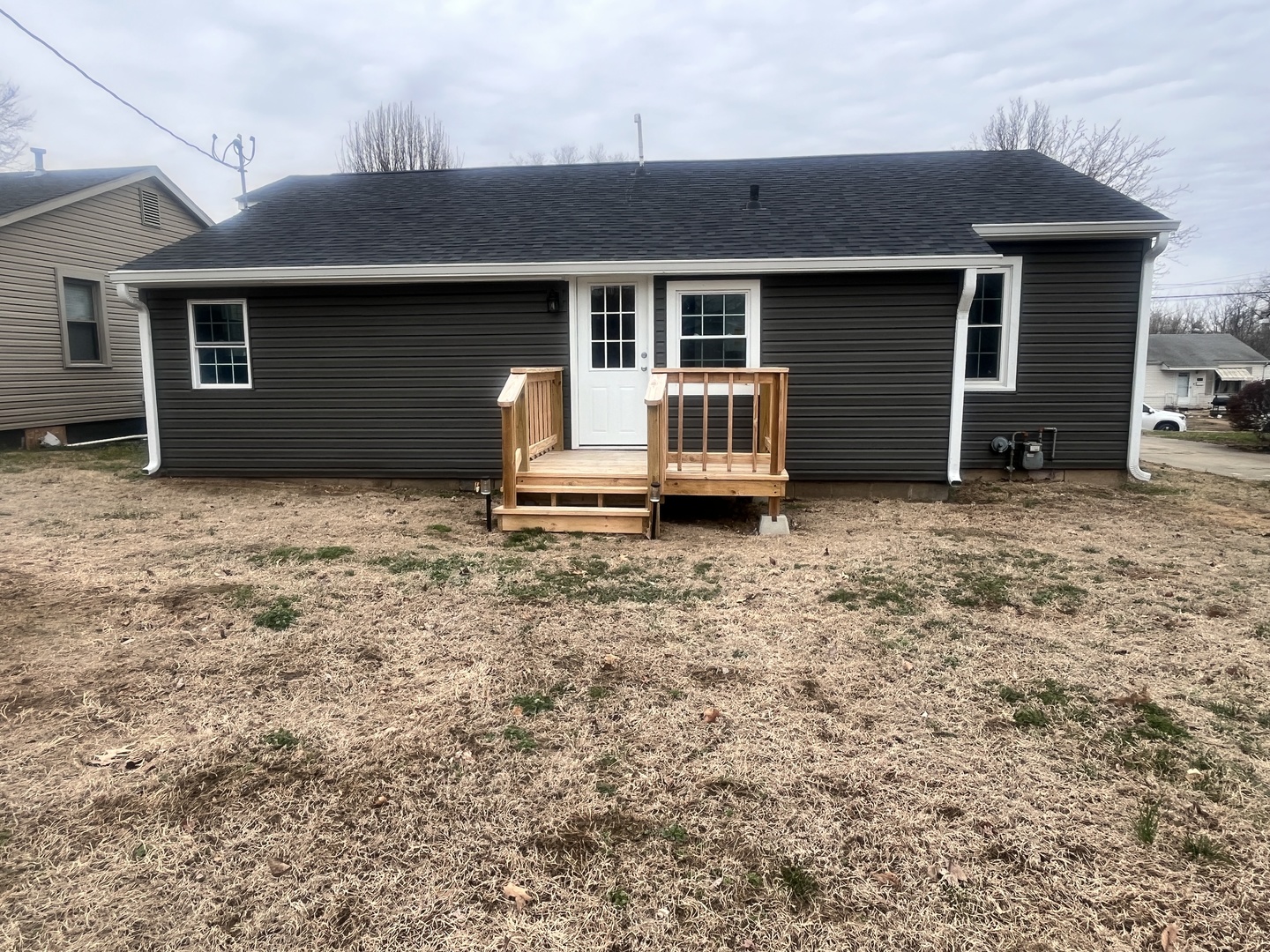 528 West 20th Street Metropolis, IL 62960 - Photo 6 of 26 a house with yard in front of it