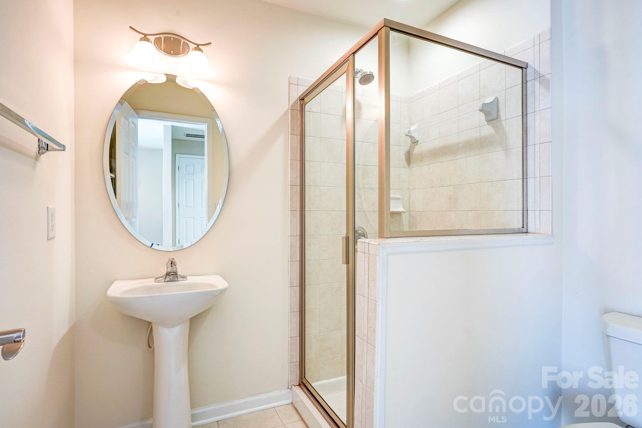 627 Sunfish Lane Tega Cay, SC 29708 - Photo 36 of 42 a bathroom with a sink and a mirror