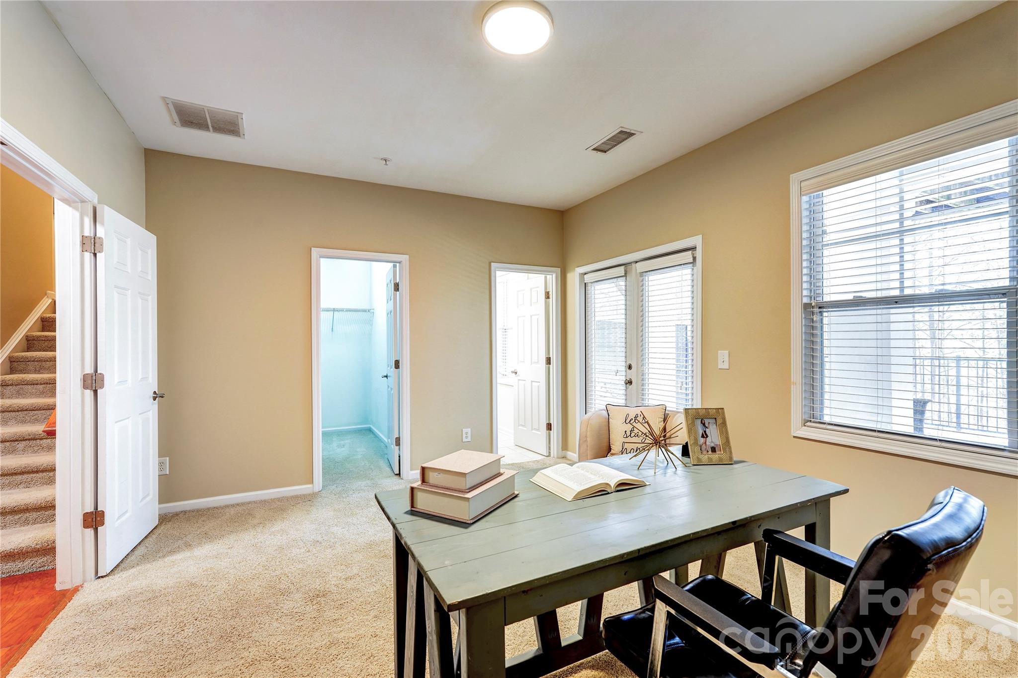 627 Sunfish Lane Tega Cay, SC 29708 - Photo 7 of 42 a view of a dining room with furniture and window