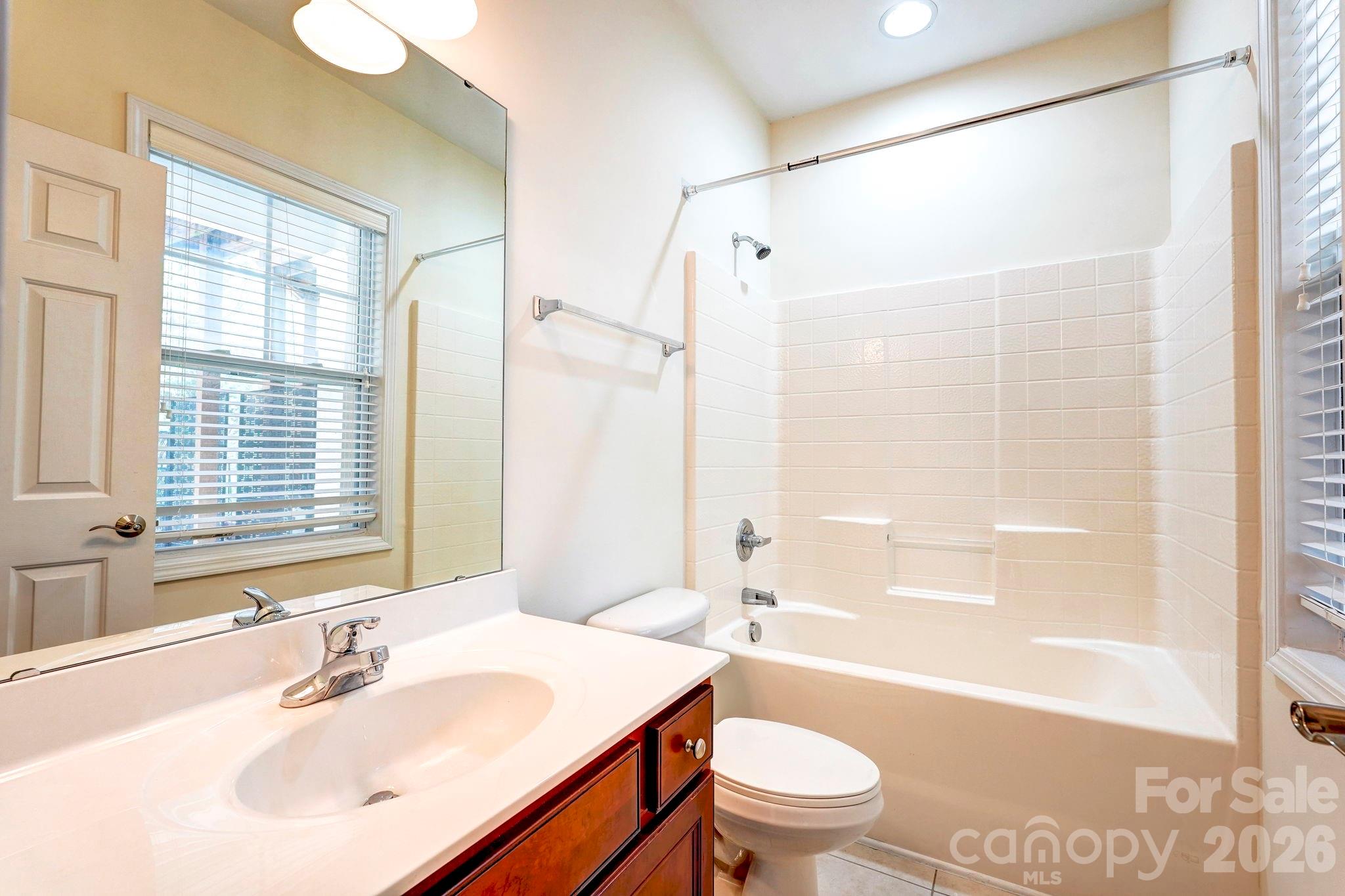 627 Sunfish Lane Tega Cay, SC 29708 - Photo 8 of 42 a bathroom with a sink toilet tub and shower