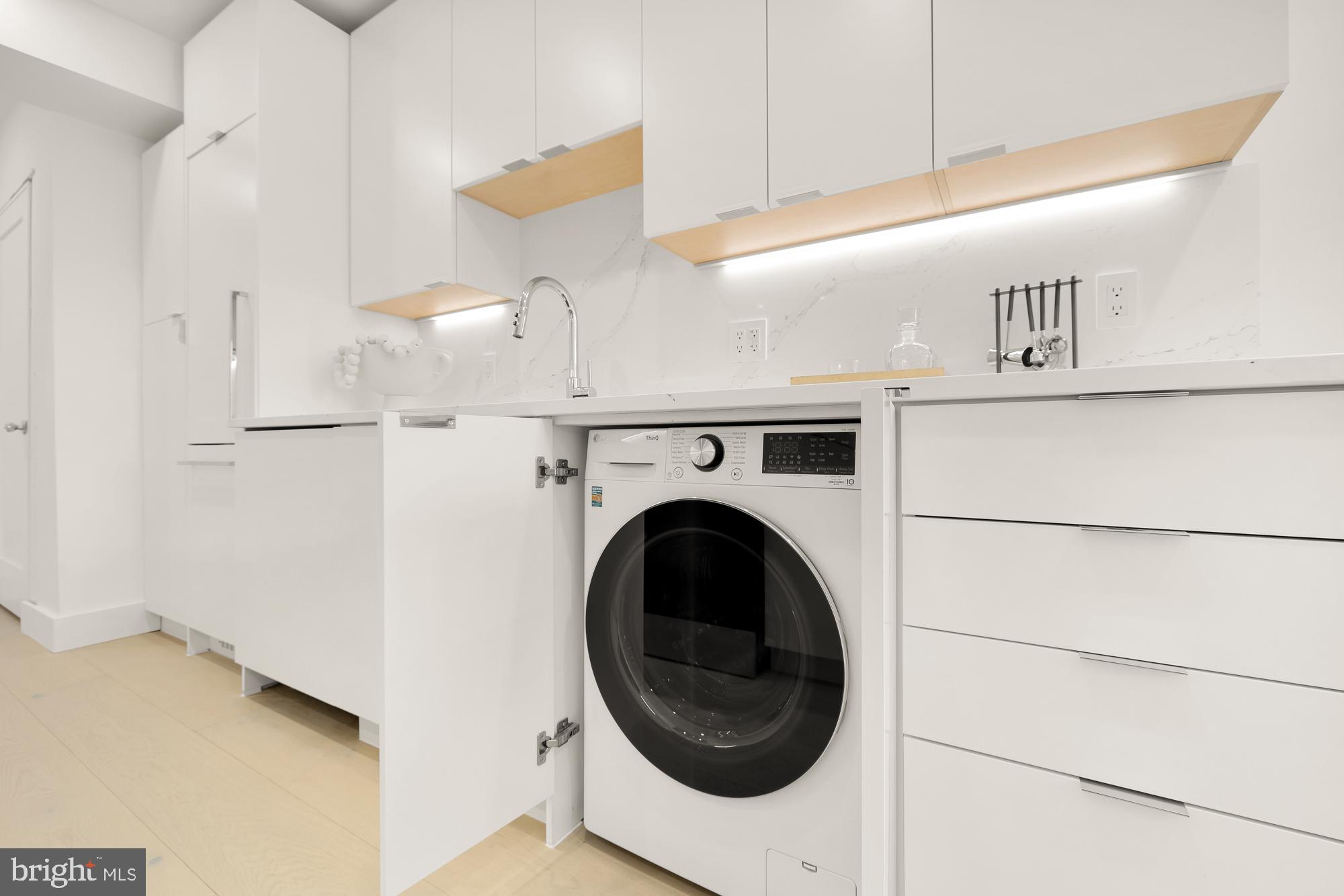 2116 Kalorama Road Northwest, Unit 205 Washington, DC 20008 - Photo 12 of 33 a utility room with dryer and washer