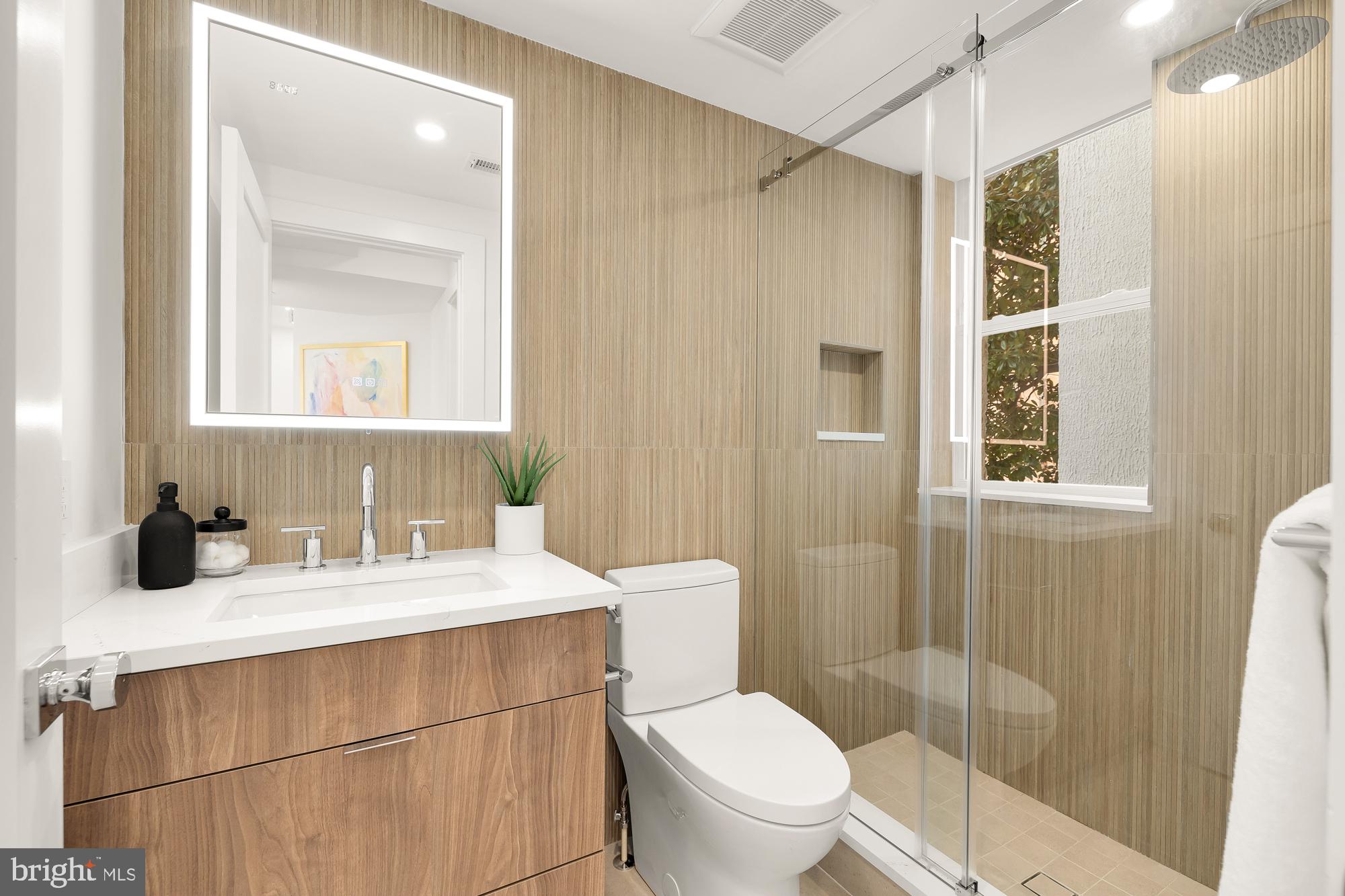 2116 Kalorama Road Northwest, Unit 205 Washington, DC 20008 - Photo 22 of 33 a bathroom with a sink vanity mirror and toilet