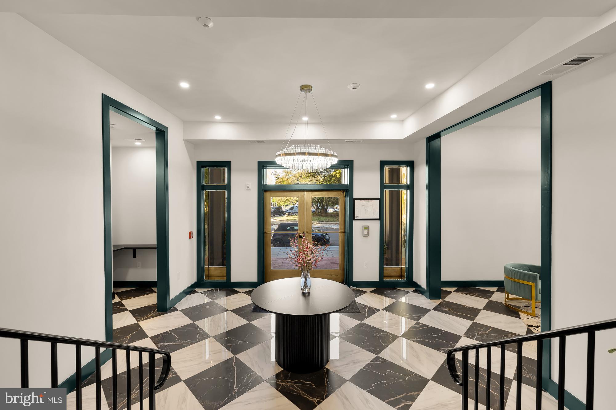 2116 Kalorama Road Northwest, Unit 205 Washington, DC 20008 - Photo 24 of 33 a lobby with furniture and window