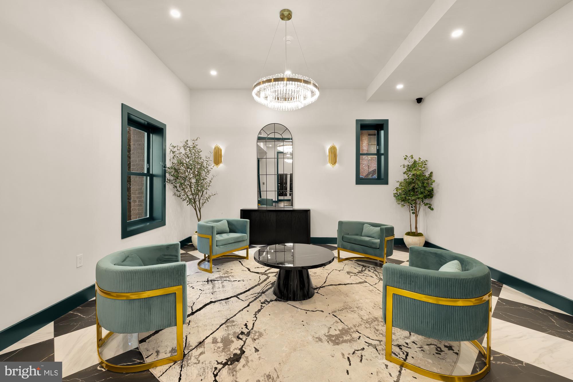 2116 Kalorama Road Northwest, Unit 205 Washington, DC 20008 - Photo 25 of 33 a living room with furniture and a potted plant