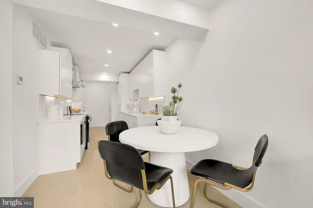 a view of kitchen with breakfast area