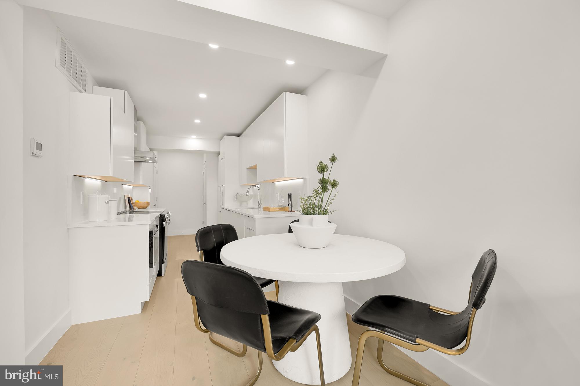 2116 Kalorama Road Northwest, Unit 205 Washington, DC 20008 - Photo 7 of 33 a view of kitchen with breakfast area