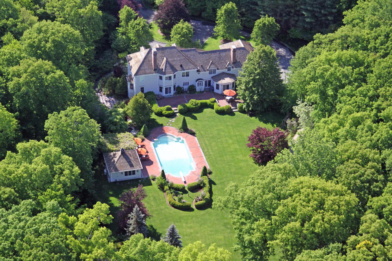 262 Lukes Wood Road New Canaan, CT 06840 - Photo 34 of 34 an aerial view of a house with a yard and garden
