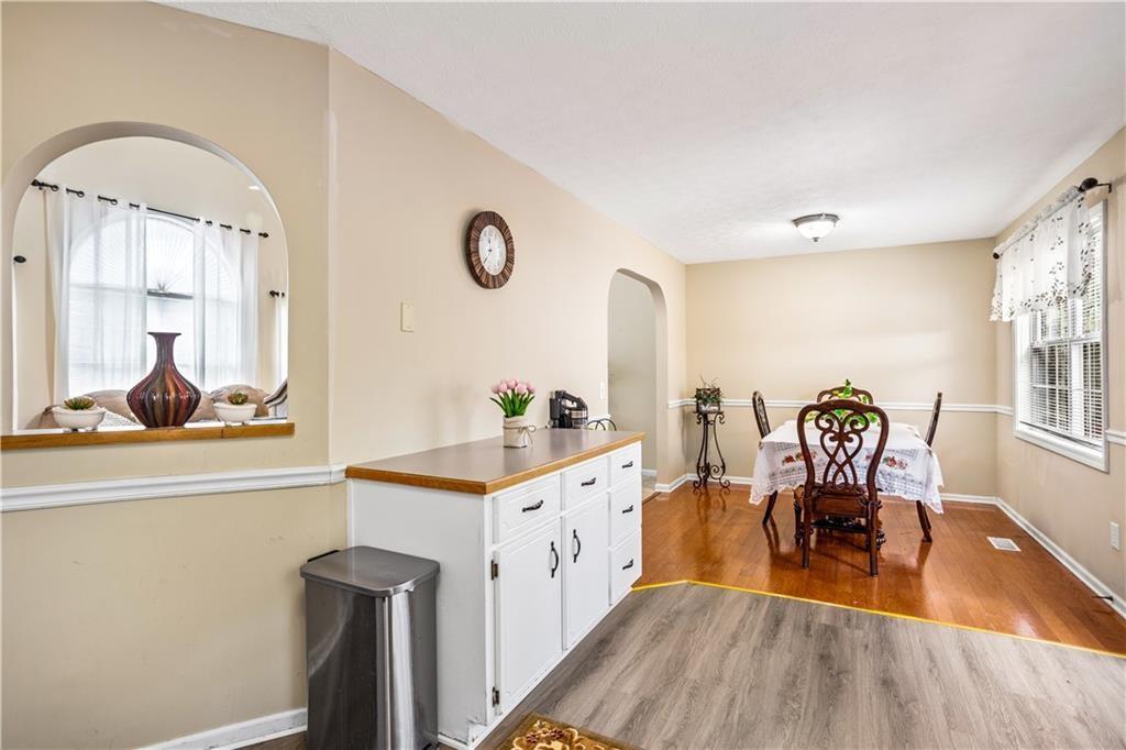 13 Greystone Lane Northwest Cartersville, GA 30121 - Photo 17 of 61 a living room with furniture two window and wooden floor