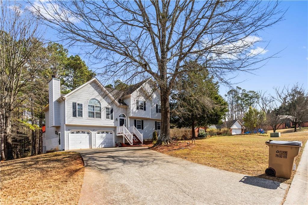 13 Greystone Lane Northwest Cartersville, GA 30121 - Photo 4 of 61 a view of a house with snow on the road