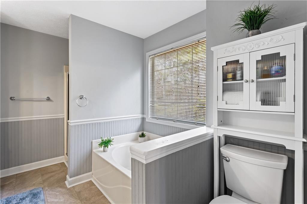 13 Greystone Lane Northwest Cartersville, GA 30121 - Photo 45 of 61 a bathroom with a sink and a bathtub