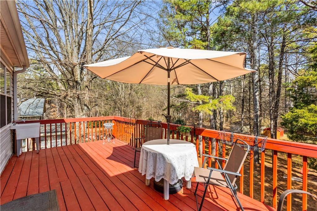 13 Greystone Lane Northwest Cartersville, GA 30121 - Photo 55 of 61 a view of balcony with wooden floor and outdoor seating