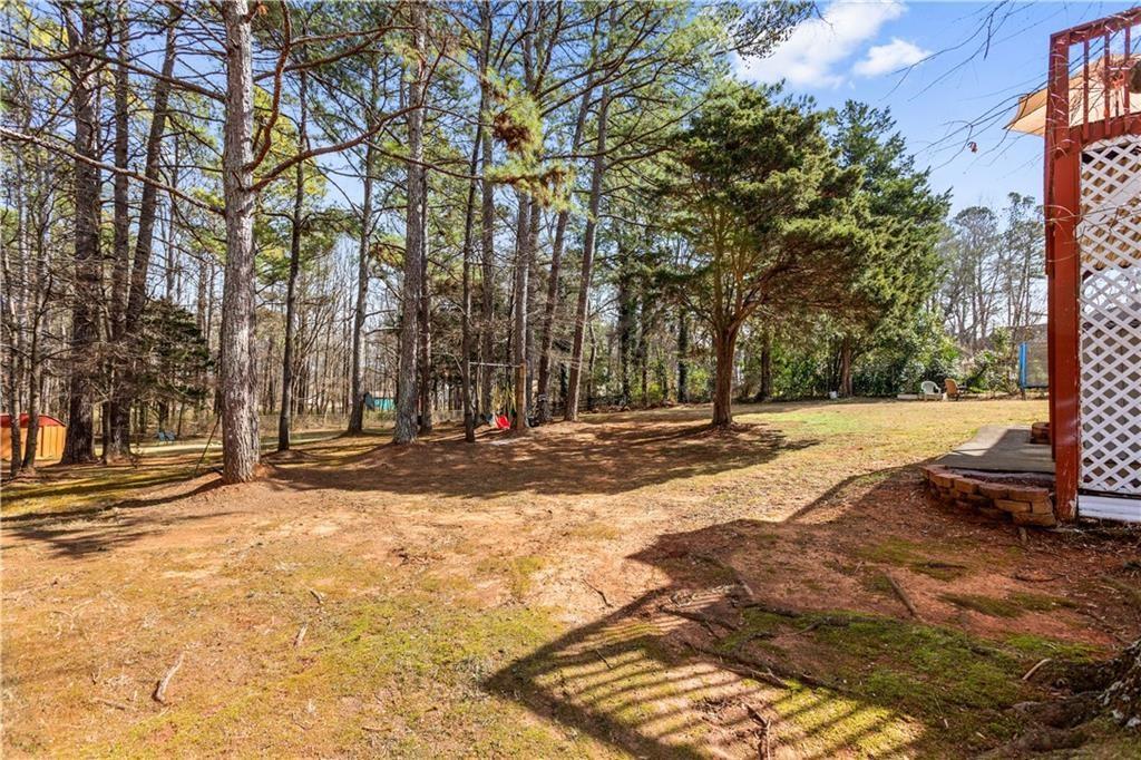 13 Greystone Lane Northwest Cartersville, GA 30121 - Photo 58 of 61 a view of road with trees