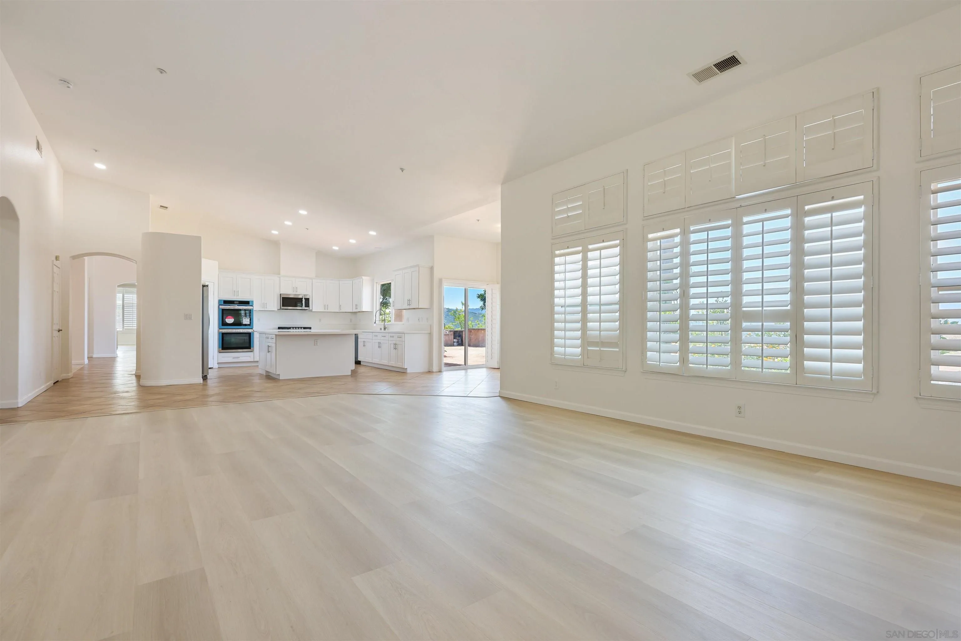 26335 Engelmann Road Valley Center, CA 92082 - Photo 12 of 42 a view of an empty room with a kitchen stove back oven